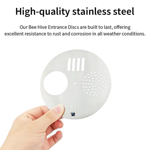 Hand holding a 4.92 inch stainless steel bee hive entrance disc, part of 4-Pack Stainless Steel Bee Hive Entrance Discs, Easy Install