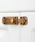 Door Window Gate Garage Security Snap Lock Sliding Bolt Zinc Alloy Buckle on a white cabinet door.