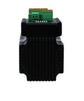 NEMA23 integrated stepper motor with top driver module, front view; black heatsink body, green terminal block.