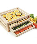 Solid Oak Food Dehydrator Rack Offering Hella Spacious Four Tray Layout For Making Jerky Fruit And Veggies Straight Up Handcrafted In Usa Top Shelf Quality with sliced oranges, peppers, and bananas.