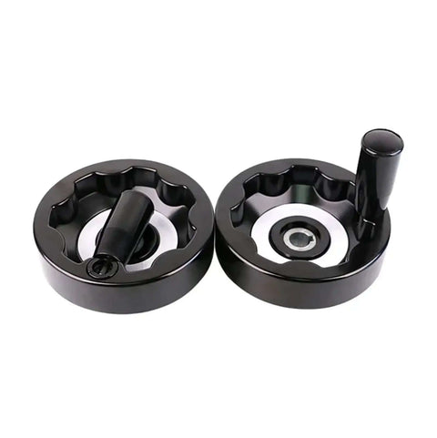 Black lathe wheel milling machine hand wheel with folding alloy handle from 10 to 20 cm rotating wheel for precision milling.