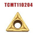Front view of gold carbide turning insert TCMT110204 with central hole, triangular 91°
