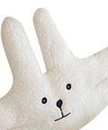 Close-up of cute door pinch guard for kids, soft PP cotton bunny design, anti-pinch safety guard, kid-friendly and fun home decor.