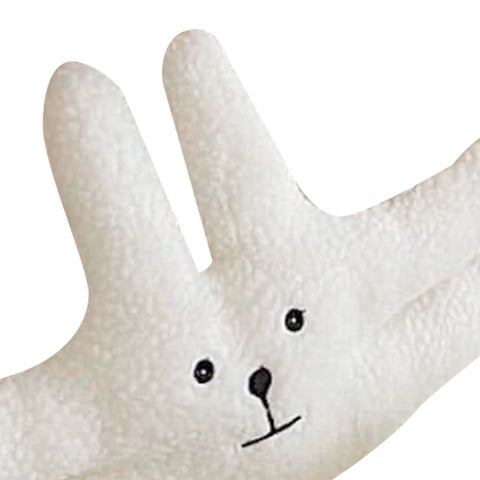 Close-up of cute door pinch guard for kids, soft PP cotton bunny design, anti-pinch safety guard, kid-friendly and fun home decor.