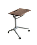 Upgrade Your Home Office Setup With This Smooth Riding Mobile Standing Desk That Dials In Your Perfect Height Fast For Seamless Sit Or Stand Flexibility Wherever You Roll, featuring a wooden top and wheeled base.