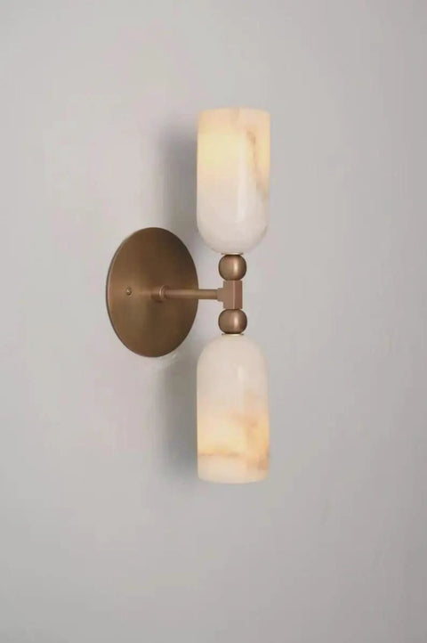 Alabaster Wall Sconce Lighting, Brass Wall Light Fixture with Natural Stone Shade, double cylinder design on wall.