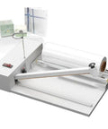 Heavy Duty Shrink Wrap Machine With Heat Gun 600Mm Width And Stainless Steel Roller on a tabletop with POF film.