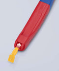 Close-up of red KNIPEX lineman's pliers handle with yellow fish-tape puller tip.