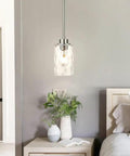 Clear Glass Pendant Light With Brushed Nickel Finish, 1 Light Modern Mini Pendant For Kitchen Island in bedroom setting
