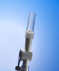 Close-up of Lifevv catheter valve with clear tubing and white lever tap