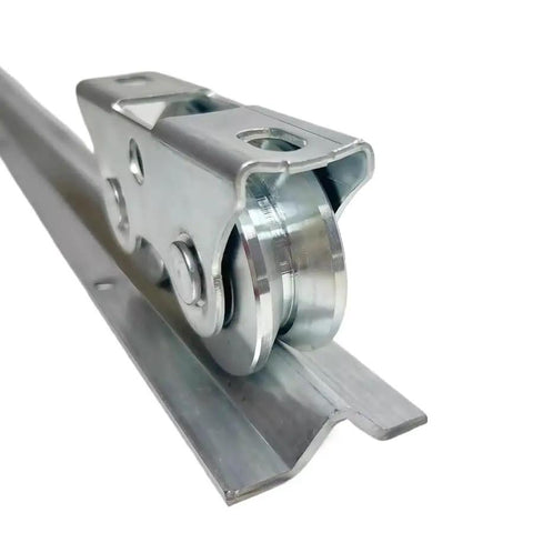 Top Shelf Iron Sliding Door V Wheel Track Rollers For Courtyard Gates And Fence Systems Featuring Smooth As Butter Glide Industrial Grade Replacement Hardware Set close-up of heavy duty iron roller on track.