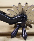 Close-up of Black Steel Western Jingle Bob Spurs for Men with slim band and two inch shank showing 16-point rowel