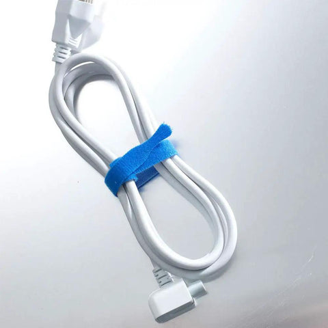 Coiled power cord secured with One Wrap Cable Ties For Easy Cable Management Self Gripping Reusable Wire And Cord Organizer 8 Inch