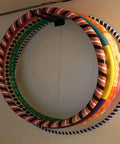 Heavyweight Garage Storage Hooks Built Like Tanks Featuring Scratch Resistant Rubber Sleeves For Rust Free Workshop Wall Tool Organization And Shop Rig Setup, displaying colorful hula hoops mounted.