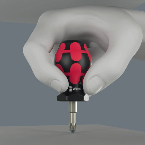 Close-up of hand holding a screwdriver from Advent Calendar 2025 For Tool Nerds And Gearheads 28 Piece Screwdriving Kit Featuring 18 Screw Profiles And Two Versatile Storage Racks You Can Stand Or Wall Mount.