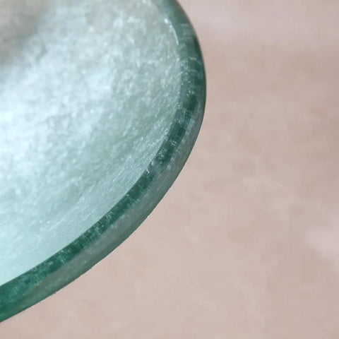 Dope Sleek Oval Glass Vessel Sink and Waterfall Faucet Combo With Pop Up Drain and Mounting Ring close-up of glossy glass edge