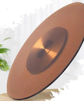 Heavy Duty Tempered Glass Lazy Susan Turntable For Dining Tables Super Slick Rotating Serving Platter 40 Inch showing brown glass on a wooden base.