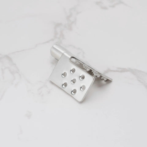 Silver metal crimp connector mounting clamp with eight holes for installing infrared heating foil
