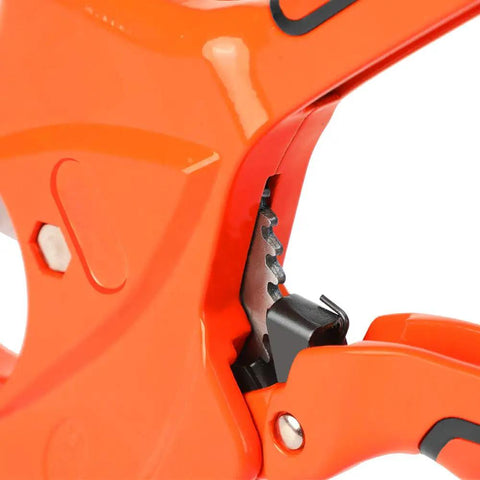 Close-up of orange ratcheting pipe cutter for PVC PEX PPR and plastic hoses, SK5 stainless steel blades visible.