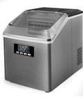 Smooth Operator Home Bar Ice Cube Maker With A Transparent Cover And Brushed Metal Frame, compact size for easy countertop use.