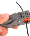 Person using Coaxial Cable Stripping And Crimping Tool With Adjustable Two Blade Knife on coax cable, showing blade depth settings