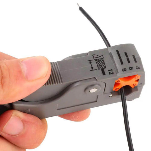 Person using Coaxial Cable Stripping And Crimping Tool With Adjustable Two Blade Knife on coax cable, showing blade depth settings