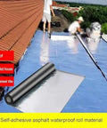 Heavy Duty Self Adhesive Waterproof Asphalt Tape For Swift Roof Patch Repairs applied on a tile-roofed house, showcasing quick repair.