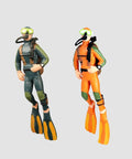 Two Pack Floating Diver Aquarium Decorations Cute Cartoon Fish Playmate That Glows In The Dark Includes Floating Balls And String For Easy Tank Setup Fun Kid Friendly Tank Accessories, featuring two resin divers in orange and green suits.