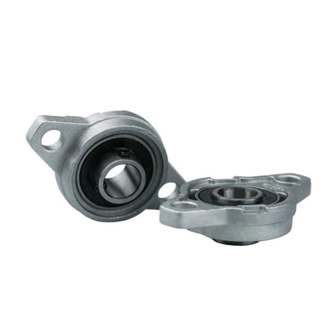 Ten Piece Zinc Alloy Pillow Block Bearing Set For Rock Solid Linear Shaft Mount No Fuss Smooth Gliding Motion Heavy Duty Insert Fits 8 10 12 mm Shafts Easily showing two zinc alloy pillow block bearings with a black inner surface.