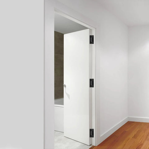 White interior door with Hidden Door Hinge Set 5 Inch Pack of 2 in 304 Stainless Steel Invisible Concealed Hinge installed for seamless look.