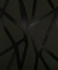 Geometric Metallic Black Intersections Peel and Stick Wallpaper by Genevieve Gorder close-up of black geometric patterns