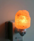Glowing pink Himalayan salt lamp night light with rotatable 360 degree wall plug, part of 2 Pack Himalayan Salt Lamp Night Light.