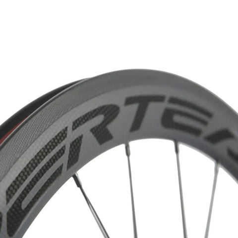 Close-up of carbon fiber road wheelset 50mm deep 23mm wide clincher 700c for Shimano 8 9 10 11 speed V brake road bikes Toray T700 construction