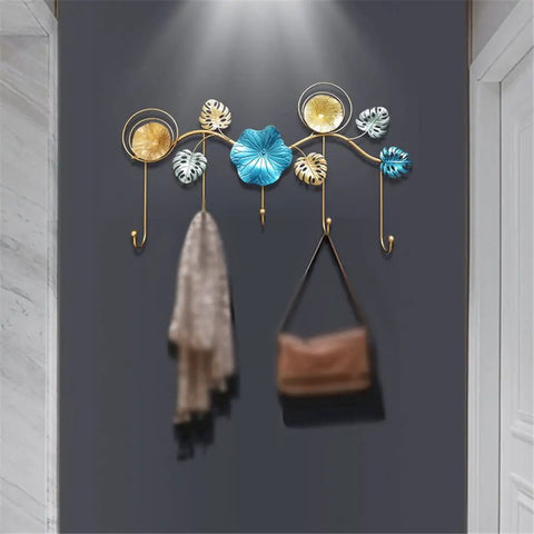 Rock Tight Wrought Iron Wall Hook For Sleek Nordic Style And Snug Door Storage That Locks In Keys Bags And Jackets Without A Sweat While Serving Heavy Duty Swag On Your Front Porch, featuring colorful hooks and wall decor.