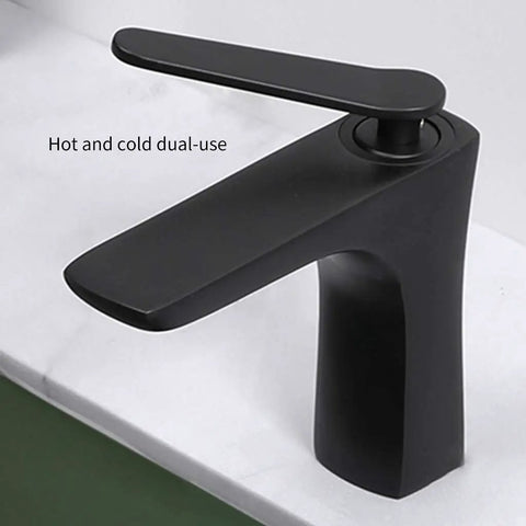 Black dual-use faucet for bathroom, modern design, suitable for hot and cold water, enhancing any lavatory setup.