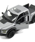 One Twenty Fourth Scale Diecast 2017 Raptor Pickup Truck Model In Gray With Openable Doors Free Wheeling Rubber Tires Window Box Packaging