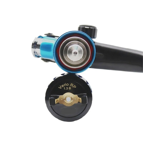 Professional 1.3mm Airbrush Spray Gun Kit With Adjustable Air Regulator And Inline Moisture Filter showing nozzle detail and size.