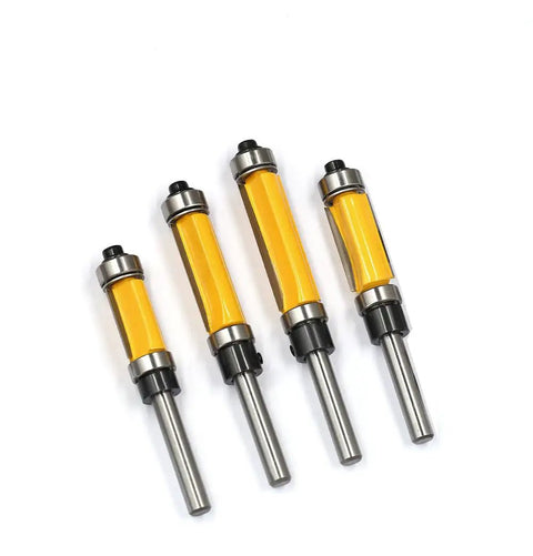 Four Piece Flush Trim Router Bit Set With One Quarter Inch Shank And Dual Bearings on a white background.