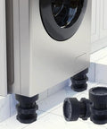 Heavy Duty Adjustable Leveling Feet For Washers Dryers And Fridges With Grippy Rubber Pads That Shut Out Moisture Guard Floors And Make Quick Tidy Ups A Total Breeze Solid Four Pack under a washing machine on tiled floor.