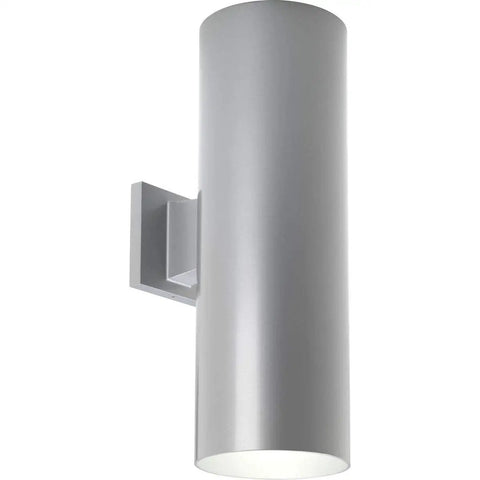 6 Inch Cylinder Outdoor Wall Sconce Two Light Up And Down Slick Modern Exterior And Interior Lighting Aluminum Construction Metallic Gray For Porch Patio Deck Weather Resistant, viewed from the side against a white background.