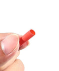 Close-up of small red tube from 127Pcs Heat Shrink Tubing Assortment In Black 2 To 1 Shrink Ratio 7 Sizes Waterproof Electrical Insulation Kit