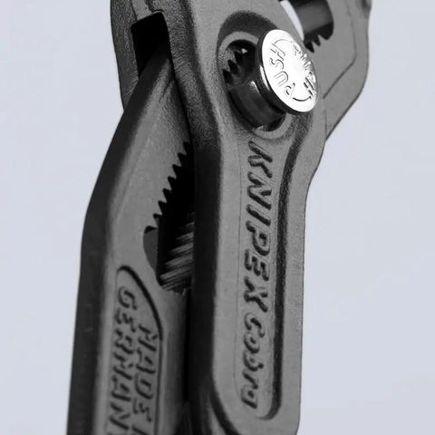 Close-up of Cobra Water Pump Pliers, 5 Inch, Red, Adjustable Pliers With Self-Locking Teeth, 13 Positions, Pinch Guard For Safe Operation