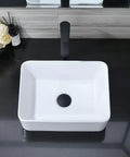 Top view of Rectangular Vessel Sink With Matte Black Faucet And Pop Up Drain 16 By 12 Inch Above Counter White Porcelain Ceramic Bathroom Basin Dope Combo Includes Water Line Hoses For Easy Install