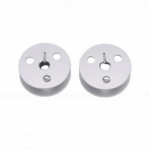 Top Shelf 4 Hole Aluminum Bobbin For Industrial Sewing Machine Direct Replacement For Durkopp 1767 767 867 887, two bobbins shown.