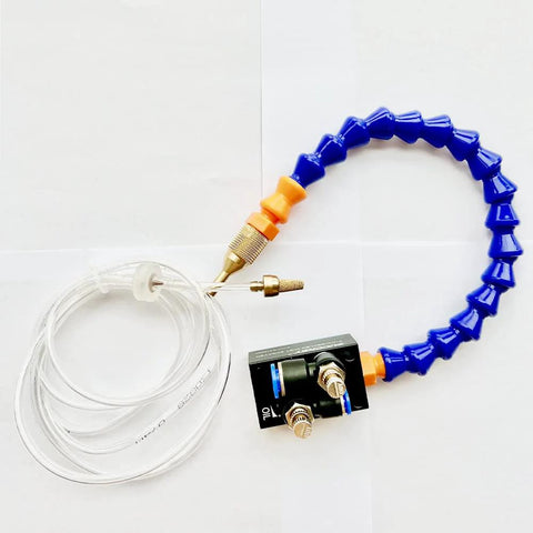 BACHIN mist coolant spray system for milling machines; blue hose with brass fittings, clear tubing, orange adapters.