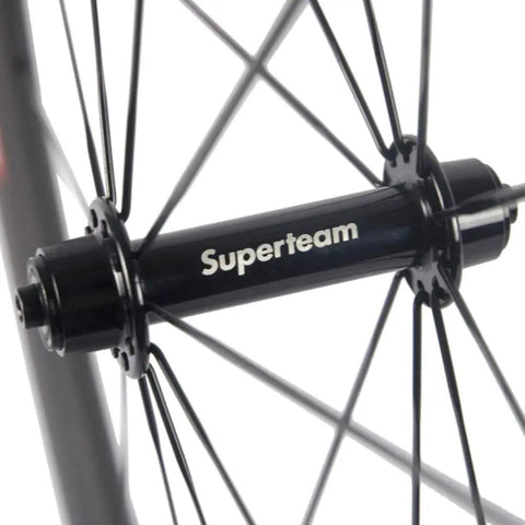 Close-up of hub on Toray T700 Carbon Fiber 50mm Clincher Wheelset for 700C Road Bikes With 23mm Wide Rim Deep Section 3K Red and White 3D Decal
