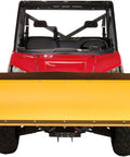 Red UTV with yellow snow plow attached to front, showcasing Transoil Expert 10W-40 Transmission Fluid for road and off-road