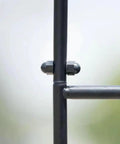 Close-up of joint detail on Steel Garden Arch For Climbing Plants Backyard Vibes Outdoor Decor, showing black epoxy finish.
