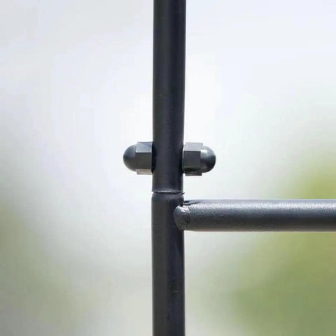 Close-up of joint detail on Steel Garden Arch For Climbing Plants Backyard Vibes Outdoor Decor, showing black epoxy finish.