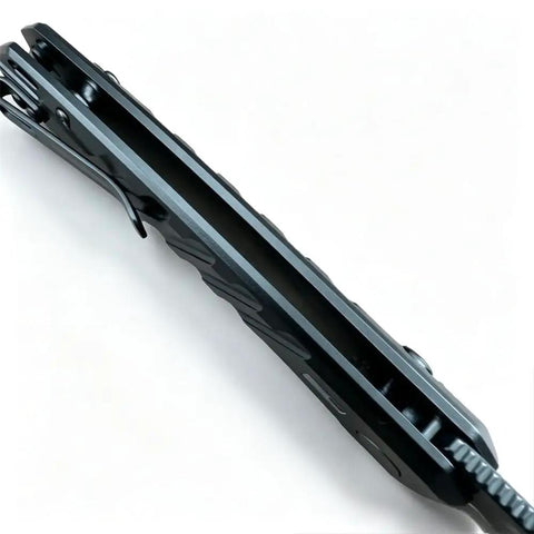 No Hassle Button Lock Pocket Knife Carrying A Razor Sharp Two Tone D2 Steel Blade And Milled Aluminum Handle With A Sturdy Reversible Clip top view showing the sleek design and clip.